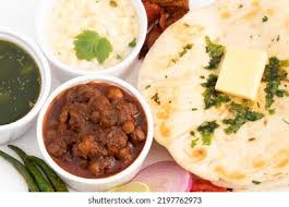 Chole Onion Kulcha Raita Green Chutney